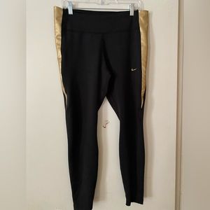 Nike leggings black and gold